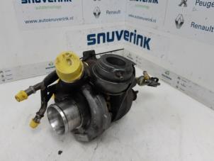 Gebruikte Turbo Renault Laguna III Estate (KT) 2.0 dCi 16V 175 FAP Prijs € 79,99 Margeregeling aangeboden door Snuverink Autodemontage