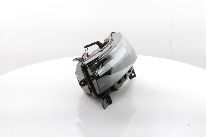 Koplamp links van een Dacia Duster (DJF) 1.6 Hybrid 140 16V 2025