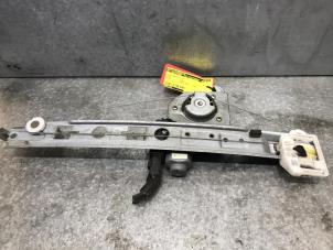 Gebruikte Ruitmechaniek 4Deurs links-achter Renault Megane II (BM/CM) Prijs € 50,00 Margeregeling aangeboden door de Nollen autorecycling