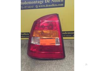 Gebruikte Achterlicht links Opel Astra G (F69) 1.6 16V Prijs € 30,00 Margeregeling aangeboden door de Nollen autorecycling