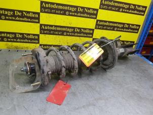 Gebruikte Veerpoot links-achter Mazda 323 Fastbreak (BJ14) 1.6 16V Prijs € 40,00 Margeregeling aangeboden door de Nollen autorecycling