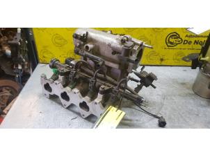 Gebruikte Inlaatspruitstuk Kia Rio II (DE) 1.4 16V Prijs € 181,50 Inclusief btw aangeboden door de Nollen autorecycling