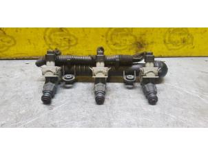 Gebruikte Injector brug Opel Corsa C (F08/68) 1.0 12V Prijs € 30,00 Margeregeling aangeboden door de Nollen autorecycling