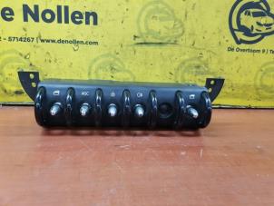 Gebruikte Schakelaar Elektrisch Raam Austin Mini Open (R52) 1.6 16V Cooper S Prijs € 35,00 Margeregeling aangeboden door de Nollen autorecycling