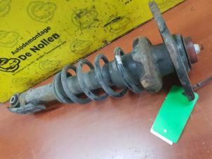 Gebruikte Veerpoot links-achter Mini Countryman (R60) 1.6 16V Cooper Prijs op aanvraag aangeboden door de Nollen autorecycling