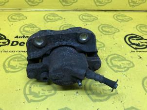 Gebruikte Remklauw (Tang) links-voor Dacia Sandero I (BS) 1.2 16V Prijs € 50,00 Margeregeling aangeboden door de Nollen autorecycling