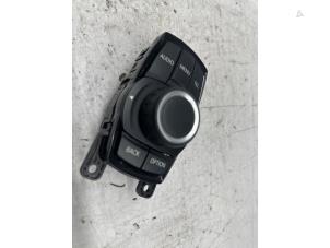 Gebruikte I-Drive knop BMW 1 serie (F20) 116i 1.6 16V Prijs € 49,99 Margeregeling aangeboden door de Nollen autorecycling
