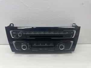Gebruikte Radio CD Speler BMW 1 serie (F20) 118d 2.0 16V Prijs € 150,00 Margeregeling aangeboden door de Nollen autorecycling