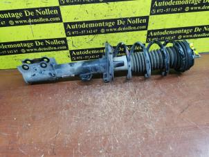 Gebruikte Mac Phersonpoot links-voor Ford EcoSport (JK8) 1.0 EcoBoost 12V 125 Prijs € 75,00 Margeregeling aangeboden door de Nollen autorecycling