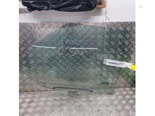 Gebruikte Portierruit 2Deurs links Volkswagen Transporter/Caravelle T4 2.5 TDI Prijs € 45,00 Margeregeling aangeboden door de Nollen autorecycling