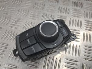 Gebruikte Multi Media Regelunit BMW 1 serie (F20) 116i 1.6 16V Prijs € 49,95 Margeregeling aangeboden door de Nollen autorecycling