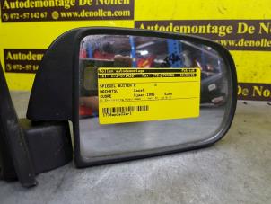 Gebruikte Buitenspiegel rechts Daihatsu Cuore (L251/271/276) Prijs € 25,95 Margeregeling aangeboden door de Nollen autorecycling
