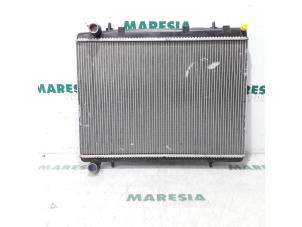Gebruikte Radiateur Citroen C4 Grand Picasso (UA) 1.8 16V Prijs € 35,00 Margeregeling aangeboden door Maresia Parts