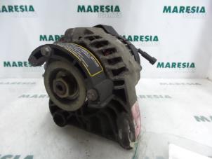 Gebruikte Dynamo Fiat Bravo (182A) 1.2 16V Prijs € 50,00 Margeregeling aangeboden door Maresia Parts