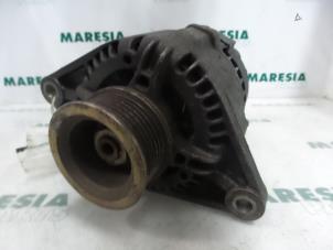 Gebruikte Dynamo Fiat Brava (182B) 1.4 S,SX 12V Prijs € 40,00 Margeregeling aangeboden door Maresia Parts