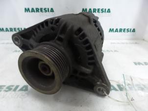 Gebruikte Dynamo Fiat Brava (182B) 1.4 S,SX 12V Prijs € 40,00 Margeregeling aangeboden door Maresia Parts