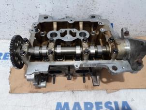 Cilinderkop van een Fiat 500 (312) 0.9 TwinAir 85 2011