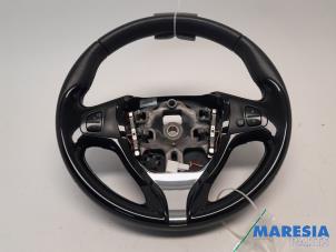 Gebruikte Stuurwiel Renault Clio IV (5R) 1.2 TCE 16V GT EDC Prijs € 59,99 Margeregeling aangeboden door Maresia Parts