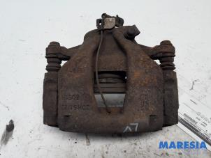 Gebruikte Remklauw (Tang) links-voor Fiat Punto Evo (199) 1.3 JTD Multijet 85 16V Euro 5 Prijs € 25,00 Margeregeling aangeboden door Maresia Parts