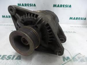 Gebruikte Dynamo Fiat Bravo (182A) 1.4 S,SX 12V Prijs € 40,00 Margeregeling aangeboden door Maresia Parts