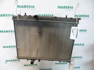 Gebruikte Radiateur Citroen C4 Berline (LC) 1.4 16V Prijs € 35,00 Margeregeling aangeboden door Maresia Parts