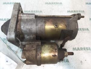 Gebruikte Startmotor Alfa Romeo GTV (916) 2.0 16V Twin Spark Prijs € 40,00 Margeregeling aangeboden door Maresia Parts