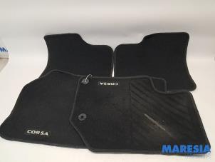 Gebruikte Matten Set Opel Corsa F (UB/UH/UP) 1.2 12V 75 Prijs € 72,59 Inclusief btw aangeboden door Maresia Parts