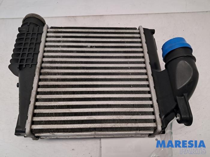 Intercooler van een Citroën C4 Picasso (3D/3E) 1.6 e-HDi 115 2014