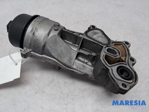Gebruikte Oliefilterhuis Citroen C4 Berline (NC) 1.4 16V VTi Prijs € 54,99 Margeregeling aangeboden door Maresia Parts