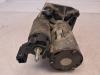Startmotor van een Peugeot 208 I (CA/CC/CK/CL) 1.0 Vti 12V PureTech 2013