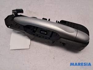 Gebruikte Portiergreep 4Deurs rechts-voor Renault Grand Scénic III (JZ) 1.6 16V Prijs € 25,00 Margeregeling aangeboden door Maresia Parts