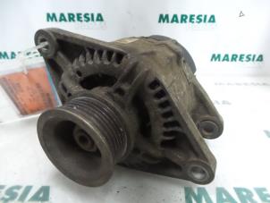 Gebruikte Dynamo Fiat Brava (182B) 1.4 S,SX 12V Prijs € 40,00 Margeregeling aangeboden door Maresia Parts
