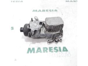 Gebruikte Oliefilterhouder Citroen C4 Picasso (3D/3E) 1.6 e-HDi 115 Prijs € 50,00 Margeregeling aangeboden door Maresia Parts