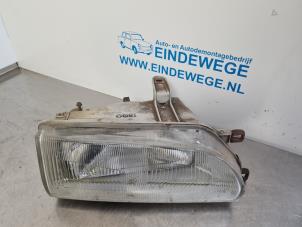 Gebruikte Koplamp rechts Toyota Corolla (E9) Prijs € 25,00 Margeregeling aangeboden door Auto- en demontagebedrijf Eindewege