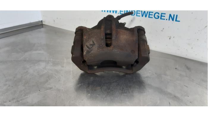 Remklauw (Tang) links-voor van een Jaguar X-type Estate 2.0 V6 24V 2004