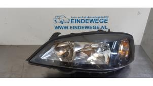 Gebruikte Linker Koplamp Opel Astra G (F70) 2.2 DTi 16V Prijs € 35,00 Margeregeling aangeboden door Auto- en demontagebedrijf Eindewege
