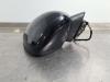 Buitenspiegel links van een Opel Crossland (X) 1.2 Turbo 12V Euro 6 2017