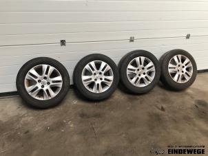 Gebruikte Velgen set + banden Opel Agila (B) 1.0 12V Prijs € 205,00 Margeregeling aangeboden door Auto- en demontagebedrijf Eindewege
