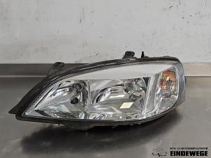 Gebruikte Koplamp links Opel Astra G (F08/48) 1.6 Prijs op aanvraag aangeboden door Auto- en demontagebedrijf Eindewege