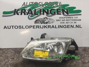 Gebruikte Koplamp links Nissan Almera (N16) 1.8 16V Prijs € 35,00 Margeregeling aangeboden door Autosloperij Kralingen B.V.
