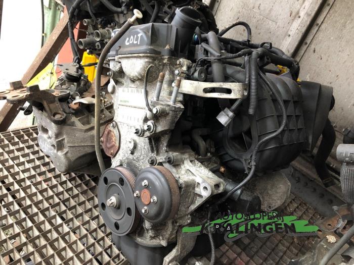 Gebruikte Motor Mitsubishi Colt (Z2/Z3) 1.3 16V Prijs € 200,00 Margeregeling aangeboden door Autosloperij Kralingen B.V.