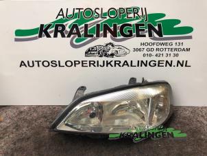 Gebruikte Linker Koplamp Opel Astra G (F08/48) 1.6 16V Prijs € 24,99 Margeregeling aangeboden door Autosloperij Kralingen B.V.