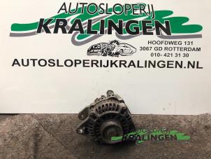 Gebruikte Dynamo Mitsubishi Colt (CJ) 1.3 16V Prijs € 50,00 Margeregeling aangeboden door Autosloperij Kralingen B.V.