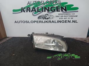 Gebruikte Koplamp rechts Mazda 626 (GW19) 1.8i 16V Prijs € 24,99 Margeregeling aangeboden door Autosloperij Kralingen B.V.