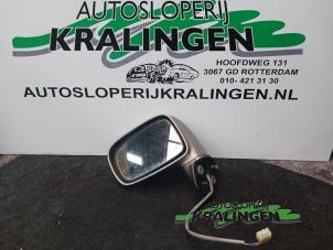 Gebruikte Buitenspiegel links Suzuki Liana (ERC/ERD/RH4) 1.6 MPi 16V Prijs € 50,00 Margeregeling aangeboden door Autosloperij Kralingen B.V.