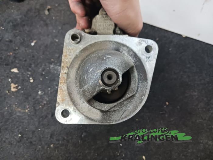 Startmotor van een Fiat Stilo (192A/B) 2.4 20V Abarth 3-Drs. 2002