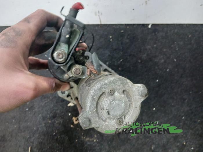 Startmotor van een Fiat Stilo (192A/B) 2.4 20V Abarth 3-Drs. 2002