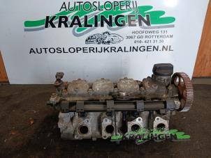 Gebruikte Cilinderkop Volkswagen Polo III (6N2) 1.4 Prijs € 100,00 Margeregeling aangeboden door Autosloperij Kralingen B.V.