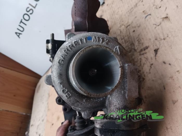 Turbo van een Opel Astra J (PC6/PD6/PE6/PF6) 1.7 CDTi 16V 125 2009