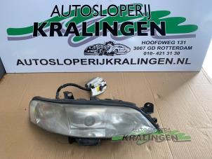 Gebruikte Rechter Koplamp Opel Vectra B (36) 1.8 16V Ecotec Prijs € 49,99 Margeregeling aangeboden door Autosloperij Kralingen B.V.
